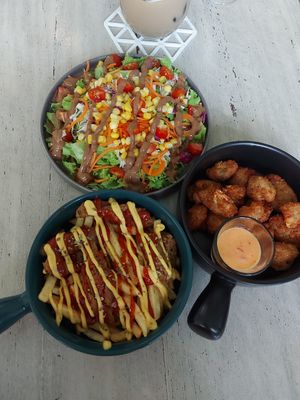 Cauli wings, salchizpapas, and mixed salad at Sauce Tree Kuta in Kuta