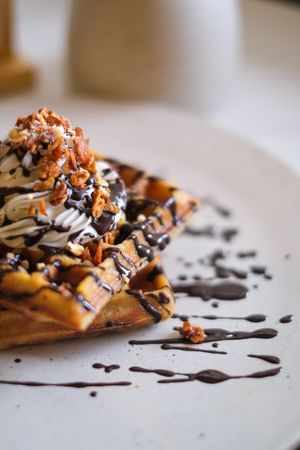 Chocolate Waffle - Chocolate sauce with homemade granola topped with whipped cream.
 at Sauce Tree Kuta in Kuta