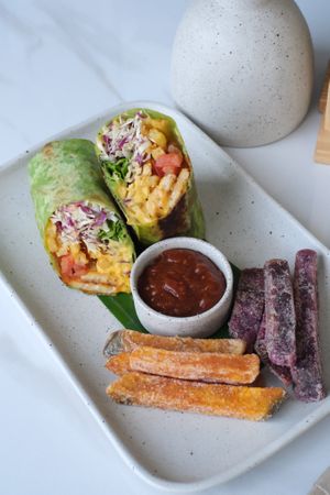 Balifornia Broritos - BBQ Tofu or Tempe, Dabu-Dabu, Fries, Lettuce and Chiz Sauce in Tortilla Wrap. at Sauce Tree Kuta in Kuta