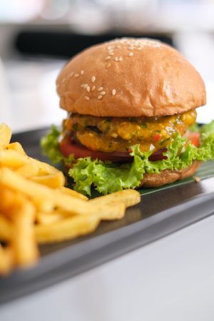 Salsa Burger - Steak patty, Grilled Pineapple, Lettuce, Tomato, Red Onion with Mango Salsa Sauce. at Sauce Tree Kuta in Kuta