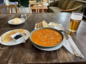 Soup of the day (chickpeas and tomato) with bread and plant-based margarine + coconut waffle with blueberry jam  at Widunderbar in Moss