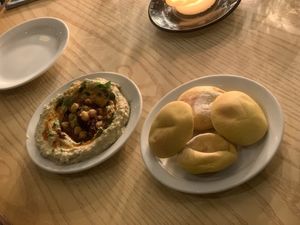 Pistachio Hummus with chilli oil and fresh mini pitta  at Evelyn's in Manchester