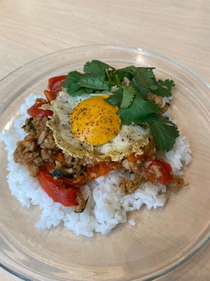 Tempeh (fermented soybeans) vegan gapao rice, spicy and so delicious!
What looks like a fried egg is a white of almond milk and rice flour, and a yolk of pumpkin or carrot! at GREENROOM in Tokyo
