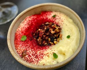 Sprouted wheat farro with oyster mushrooms, pine nuts, coconut milk and green curry foam. at Homa Restaurant in Belgrade