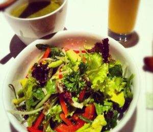 Raw salad, green goddess soup, and orange spice juice  at Pure and Whole - JingAn in Shanghai