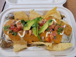 Shoreline Burrito "Wet" Style :) at La Jenelle Natural Cafe in Oxnard