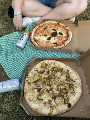 the one in the front is the vegan "pizza rosa"  at Ragazzi Pizza & Bar in Prague
