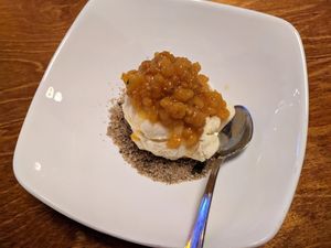Oat icecream with cloudberries and cookie crumbs at Public House Selvä Pyy in Aekaeslompolo