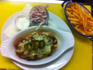 Vegan chilli cheese dog with vegan coleslaw and fries at Rock Ola in Brighton