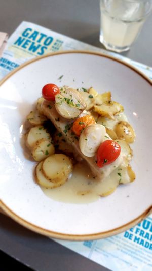 Vacalao al pilpil at Distrito Vegano Invernadero in Madrid