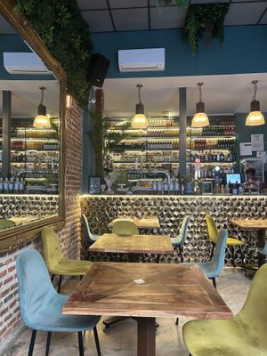 Indoor seating  at Distrito Vegano Invernadero in Madrid