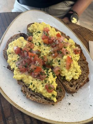 tofu scramble on toast (cheaper)   at Distrito Vegano Invernadero in Madrid