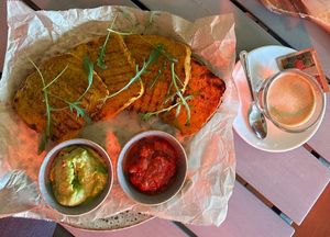 Vegan french toast with homemade guacamole and tomato pasta; cortado with rice drink at Törökméz in Budapest