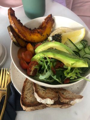 Salad with quinoa, pumpkin, avocado, hummus, tomstoes, dried tomatoes, cucumber etc. at Pure Boutique in Canggu