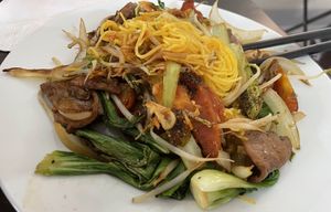 Noodles and vegetables   at Tinh Tam Vegan in Hue
