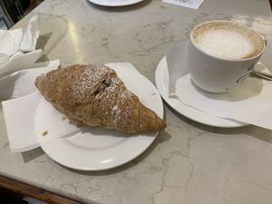 Vegan apricot croissant and soy cappuccino  at Pasticceria Rosa Salva in Venice