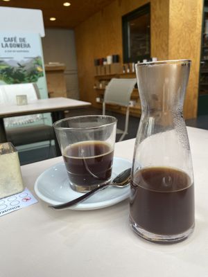 French press (European coffee poster behind)  at moxxa.caffè in Cologne