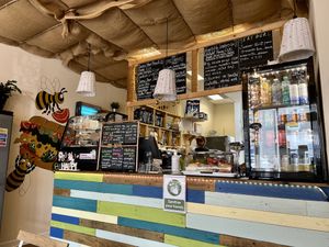 Counter bar with selection of drinks and baked goods  at Bagel Society in Aberdeen