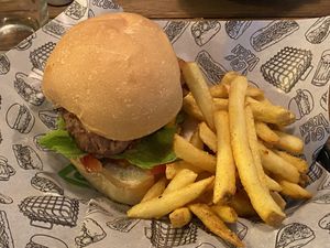 Nice burger, very salty fries.  at La Loncheria Bcn in Barcelona