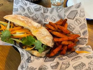 Bahn mi with sweet potato fries  at La Loncheria Bcn in Barcelona