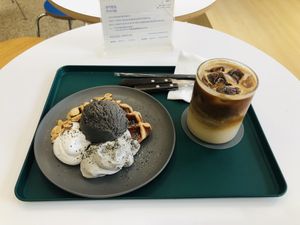 Waffle with Black Sesame Ice Cream, Whipped Cream & Iced Vanilla Latte 💚  at Nuldam Space - 널담은공간 경복궁점 in Seoul