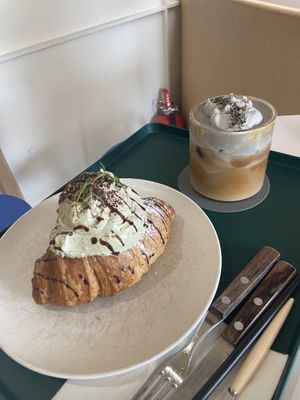 Matcha cream croissant, black sesame iced coffee  at Nuldam Space - 널담은공간 경복궁점 in Seoul