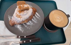 Decaf Cappucino with Oat Milk and a Croissant with whipped cream, cinnamon and biscoff cookies at Nuldam Space - 널담은공간 경복궁점 in Seoul