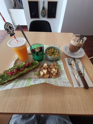 Vegan breakfast with an iced latte at O Ninho Family Bar in Lagos