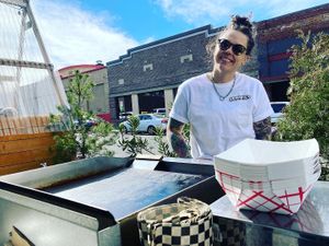 Chef/Owner Sam Orskog showin off the new shirts!  at Sammies in Bellingham