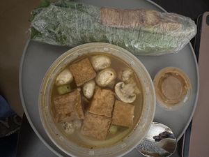 Tom yum soup cup and tofu rolls  at Kinn Thai Cuisine in Fort Collins