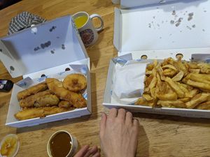 Frickles, battered sausages, battered fish (banana blossom) and battered pineapple at Crookes Chippy in Sheffield