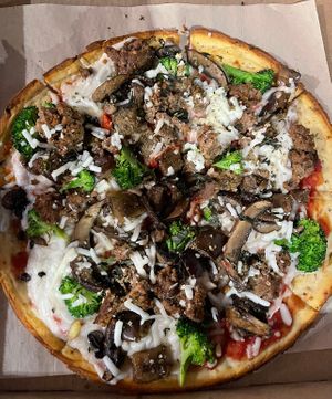 vegan pie w impossible meat   at Pesto in San Diego