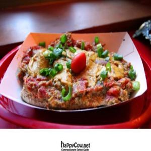 Vegan Mama Tatianaon: Tomatoes, artichoke hearts, fresh basil & garlic with Vegan Cheese... Baked to perfection! at Cyber Dogs in Seattle