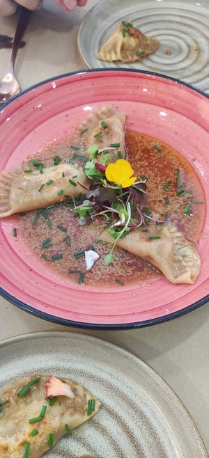 Dumplings in sauce (portion brought 5 dumplings) at Puravita Vegan  in Estepona