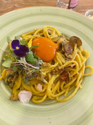 Vegan carbonara with egg yolk. I wish I had the egg yolk recipe to recreate when I get home, loved it and it burst open like a real egg. No animals harmed  at Puravita Vegan  in Estepona