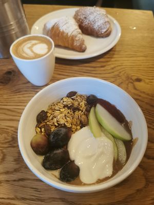 Porridge with frea granola, homemade jam, fruits. at FREA Bakery in Berlin