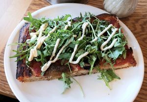 tray-baked sourdough pizza with tomato and aragula #Veganuary at FREA Bakery in Berlin