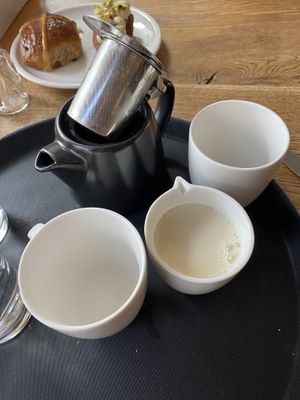 Pot of Earl Grey tea with Oatly oat milk  at FREA Bakery in Berlin