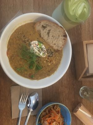 Linsen-Paprika-Eintopf (12€), Matcha Latte (5€), 100g hausgemachter Kimchi (4€)  at FREA Bakery in Berlin