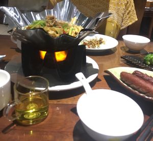 Example of playing and lotus tea. at Fu Hui Ci Yuan Vegetarian Restaurant in Beijing