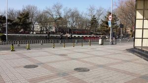 Turn right here on Dong'anmen St. This is standing next to Golden Jaguar noted in the directions at Fu Hui Ci Yuan Vegetarian Restaurant in Beijing