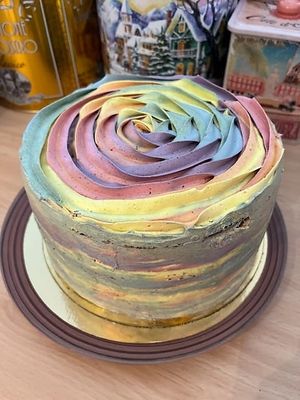 Rainbow cake made on order (plant based colors!) at Avec&Sans in Perigueux