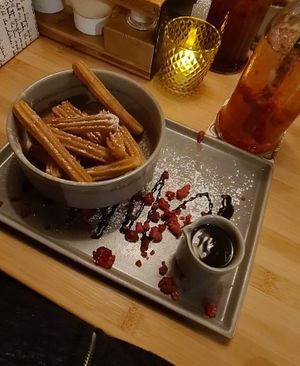 Churros mit Schokosauce at Daintree in Kempten