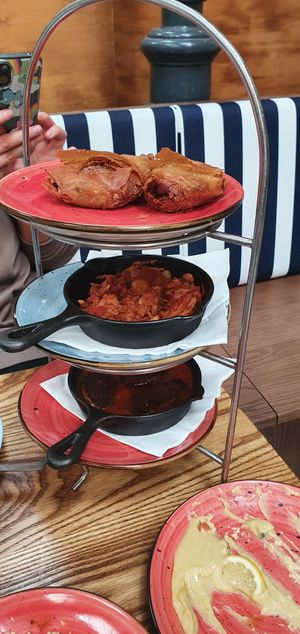 Hot meze (top to bottom): CHICKPEA FILO TRIANGLES, JACKFRUIT STIFADO, 
VEGAN MEATBALLS – SOUTZOUKAKIA at The Real Greek in Manchester