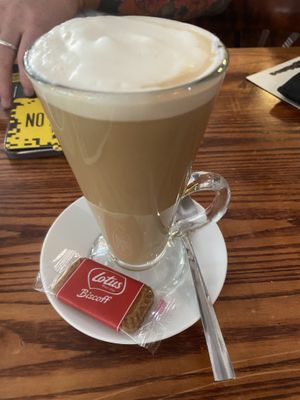 Latte with soy milk and a biscoff biscuit  at Fog on The Tyne in Gateshead