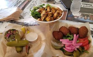 Falafel wrap, chicken salad, & vegan kibbeh rolls at Kareem's in Anaheim