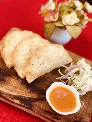 Empanadas de masa fresca rellenas de hongos locales  at La Tradición in Palenque