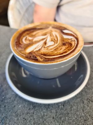 Coffee, soy milk at The Cardamom Pod in Southport