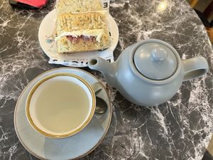 Lemon ginger tea and vegan pistachio loaf  at Joice Cafe in South West London