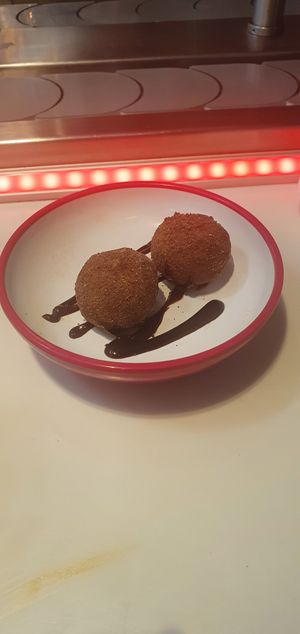 Chocolate dough-chi: Chocolate cookie dough covered ice-cream bites (ve) at Yo! Sushi - Trafford in Manchester